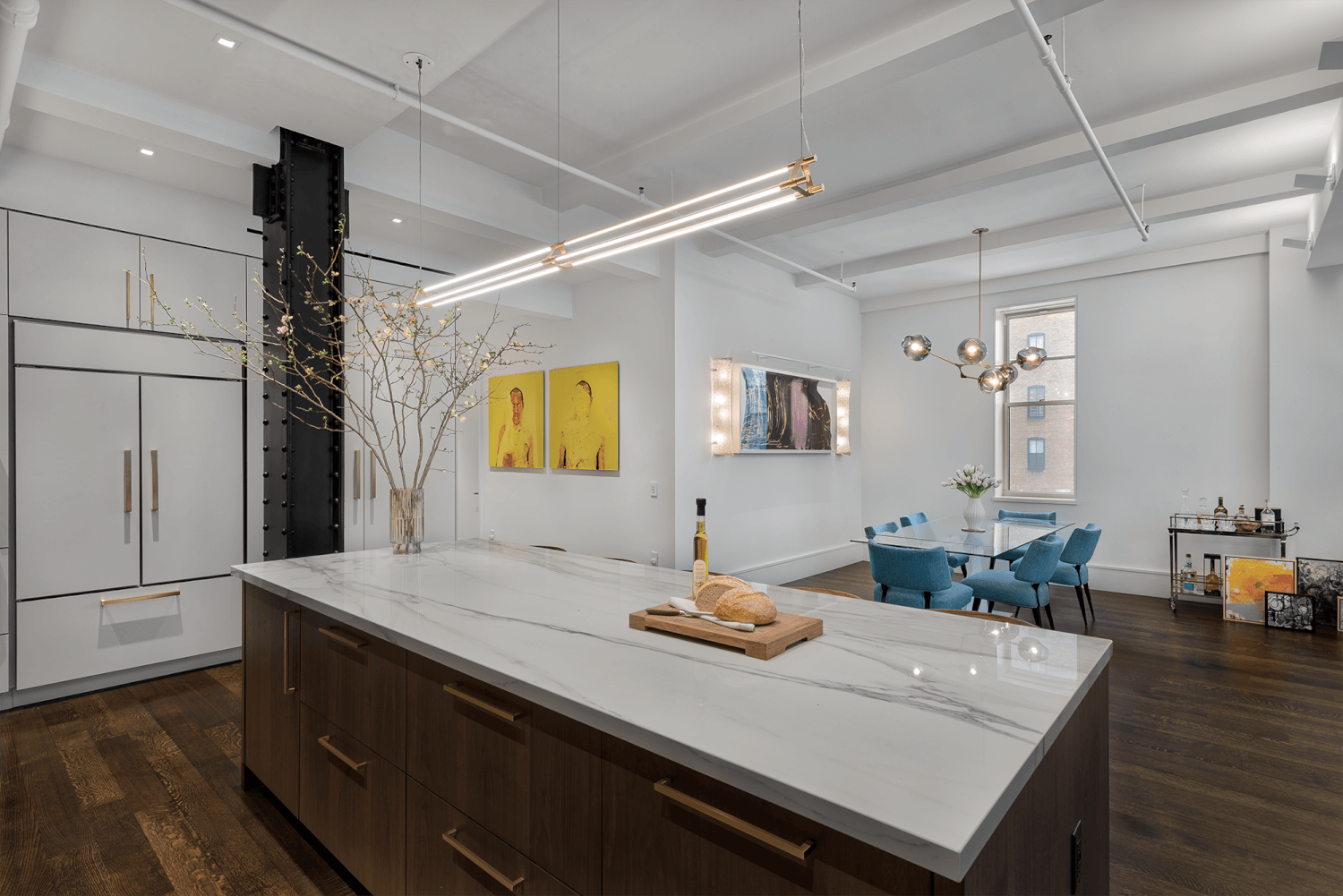 Flat Iron Loft Features Modern Kitchen Island Lighting